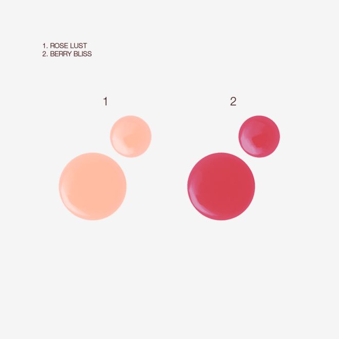 Tinted Lip Oil in Rose Lust and Berry Bliss swatches Swatches of two, high-shine sheer lip oil in pale pink and berry-rose shades.