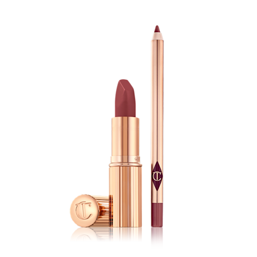 Iconic Matte Lip Kit open An open red lipstick with a matte finish in golden-coloured tube with a lip liner pencil in a matching shade.