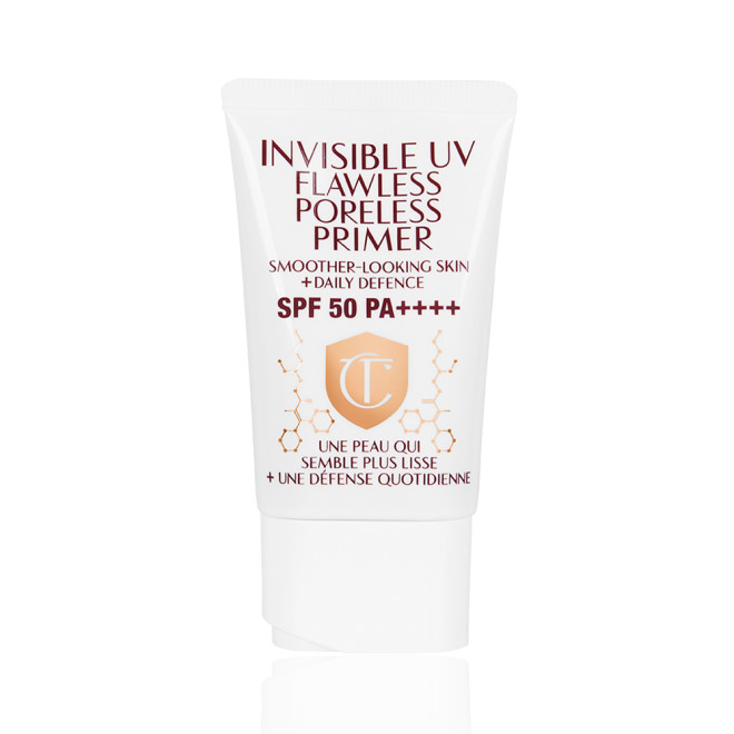A primer in a white-coloured tube with a white-coloured lid with text on it that reads, 'invisible UV Flawless poreless primer SPF 50 PA++++'.