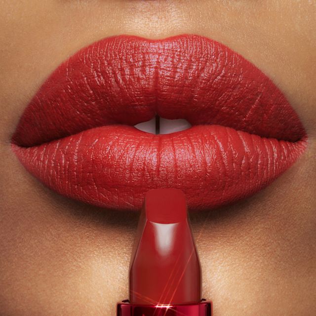 Natural Red lipstick close up Model wearing Mark of a Kiss natural red lipstick