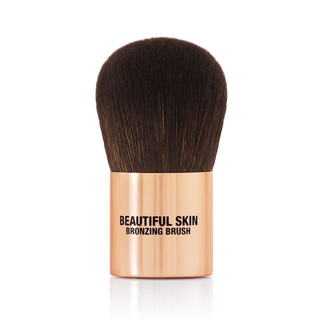Beautiful Skin Brush packshot for blog Charlotte's Beautiful Skin Bronzer Brush is a domed, synthetic, Kabuki-style brush for blending out bronzer