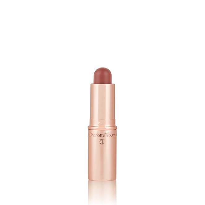 Quick & Easy Instant 5 Minute Super Fresh Look lip and cheek stick open An open, lip and cheek colour stick in a glowy brown-pink shade in a golden-coloured tube.