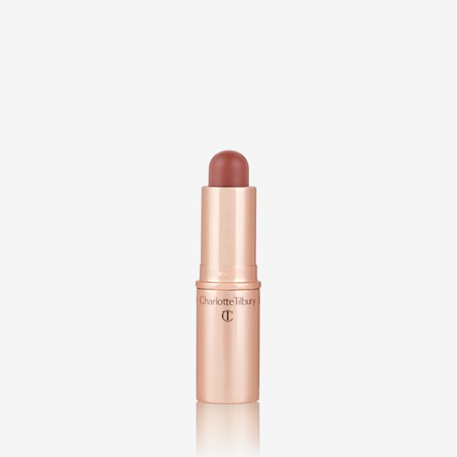 Quick & Easy Instant 5 Minute Super Fresh Look lip and cheek stick open An open, lip and cheek colour stick in a glowy brown-pink shade in a golden-coloured tube.