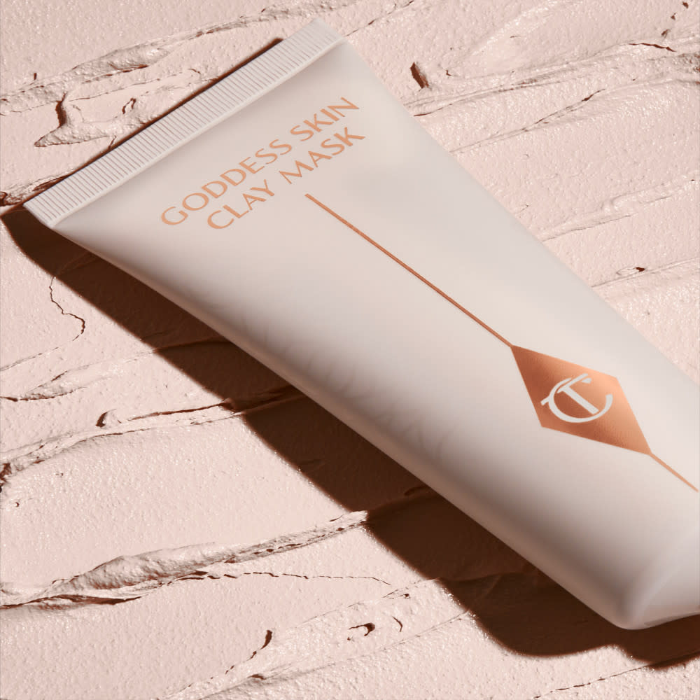 A wash-off clay mask in a white-coloured tube with a gold-coloured lid.