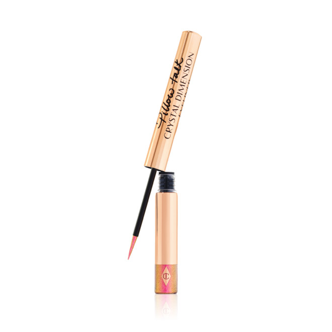 Glittery vivid, rose pink eyeliner in a gold-coloured tube with a black and gold-coloured, thin eyeliner wand. 