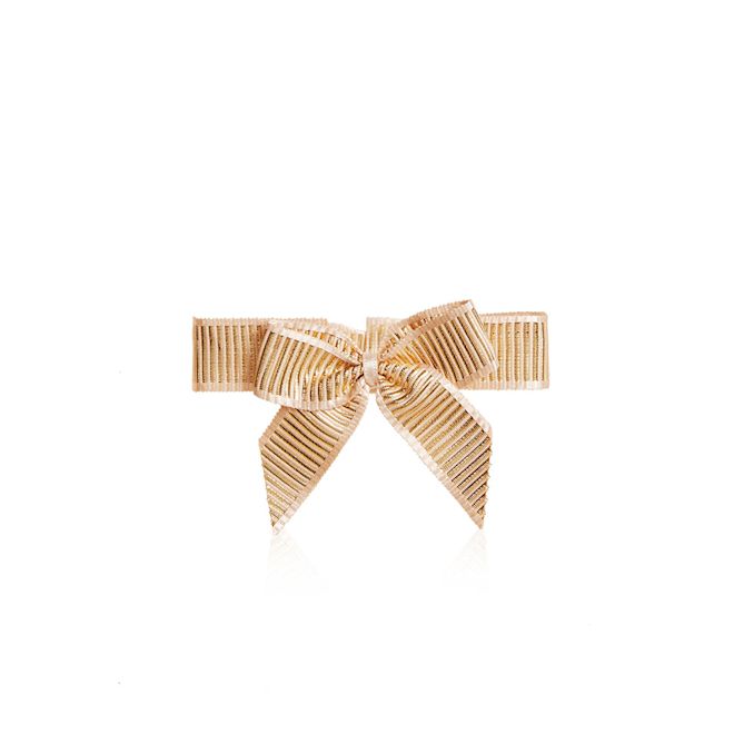 Magic Cream Ribbon A shiny champagne-coloured ribbon tied in an elegant bow.
