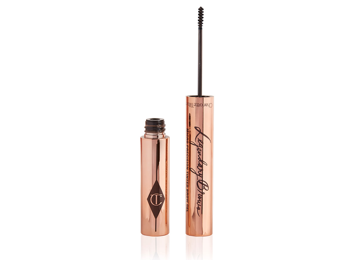 Legendary Brows Eyebrow gel open Open brow gel with a thin brush for precision, and a shiny, gold-coloured tube.