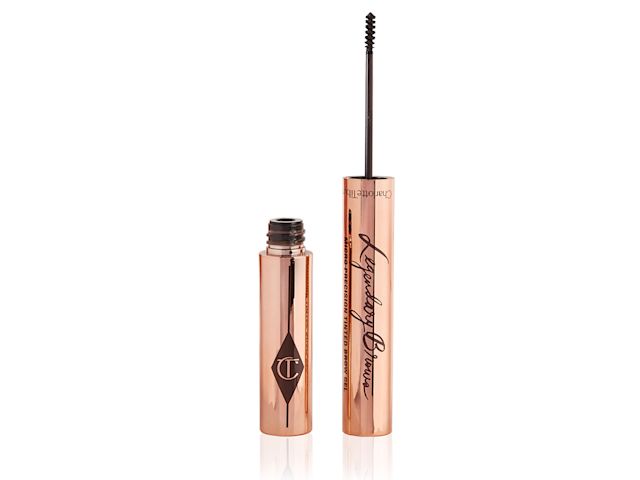Legendary Brows Eyebrow gel open Open brow gel with a thin brush for precision, and a shiny, gold-coloured tube.