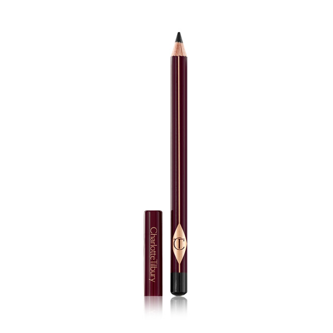 An open, black eyeliner pencil with the CT logo printed on it with its lid next to it. 