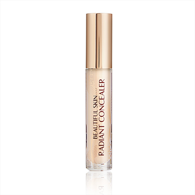 Radiant concealer in a glass tube with a gold-coloured lid with text on the tube that reads, 'Beautiful Skin Concealer'