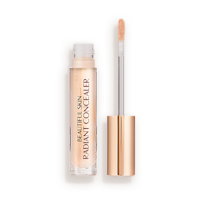 Beautiful Skin concealer in 2.5 closed Radiant concealer in a glass tube with a gold-coloured lid with text on the tube that reads, 'Beautiful Skin Concealer'