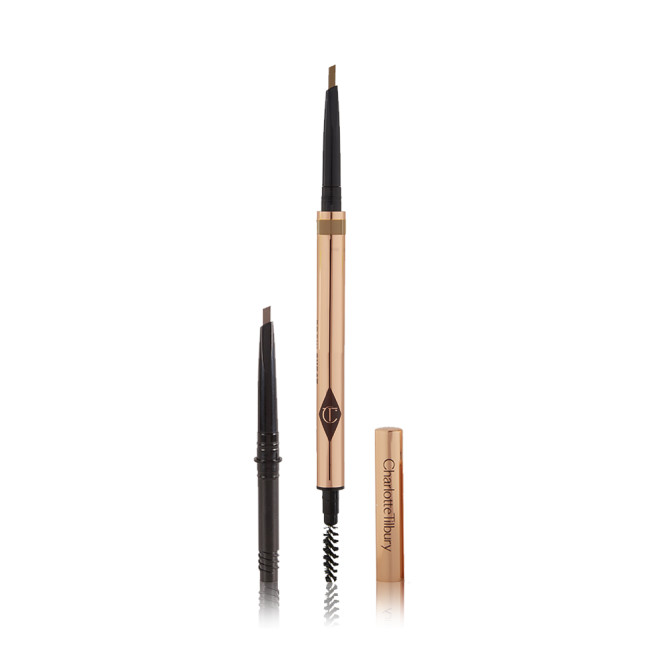 A double-ended eyebrow pencil and spoolie brush duo in a light blonde shade with gold-coloured packaging and the refill besides it.