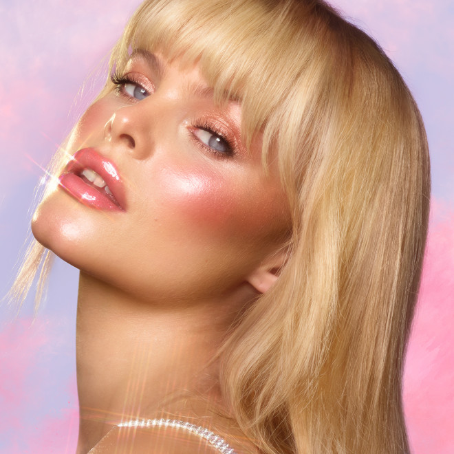 Meg wearing a pink blush look for cool-toned skin using Pinkgasm Beauty Light Wand