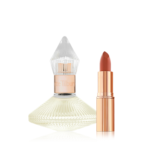 Scent of A Pillow Talk Dream Kit A 50 ml perfume in a glass bottle with a glass lid with an open lipstick in a peachy-red shade in a golden-coloured tube.