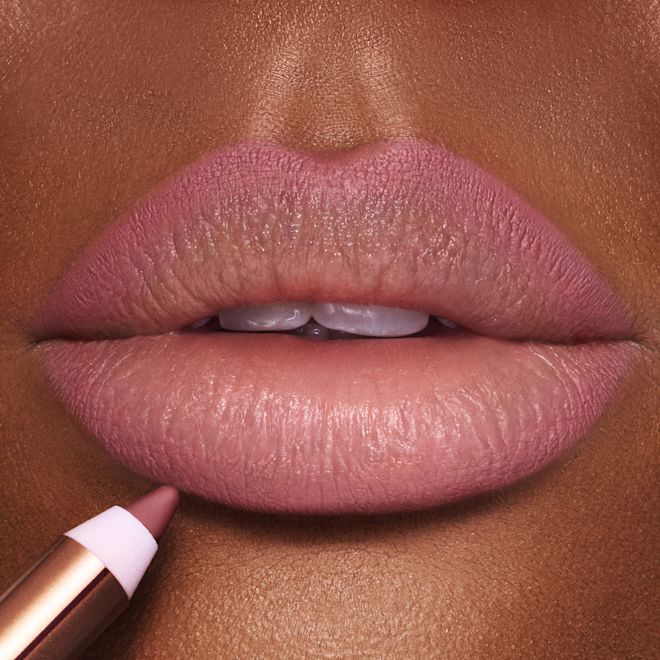 Lip Cheat Pillow Talk Medium Lip Liner on a close up of lips Lip Cheat Pillow Talk Medium Lip Liner on a close up of lips