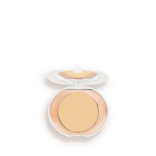 Mini Airbrush Brightening Powder in Tan/Deep A miniature compact brightening powder in a white shade for tan and deep skin tones.