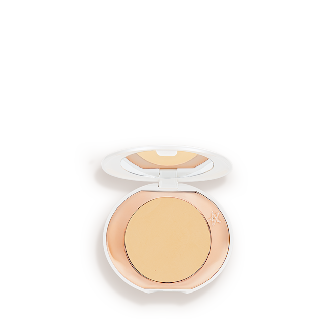 Mini Airbrush Brightening Powder in Tan/Deep A miniature compact brightening powder in a white shade for tan and deep skin tones.