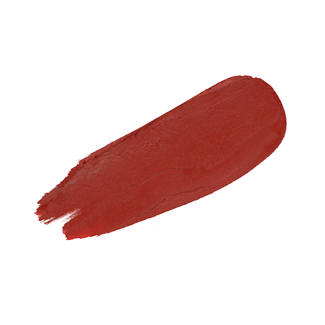Limitless Lucky Lips in Love Flame swatch Swatch of a matte lipstick in a tawny orange-red shade.