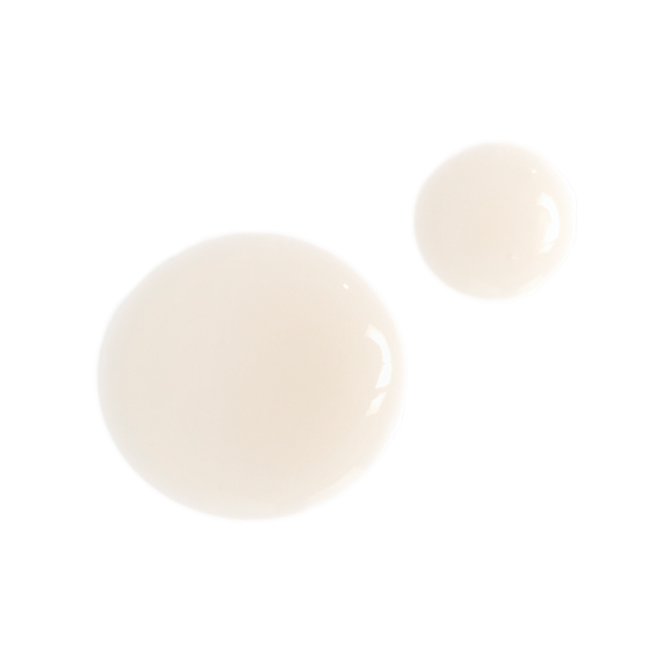 Charlotte's Magic Serum Crystal Elixir swatch Swatch of a cream-coloured pearlescent face serum.