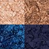 Luxury Palette in Super Blue swatches Swatches of four, matte and shimmery eyeshadows in shades of blue and gold.