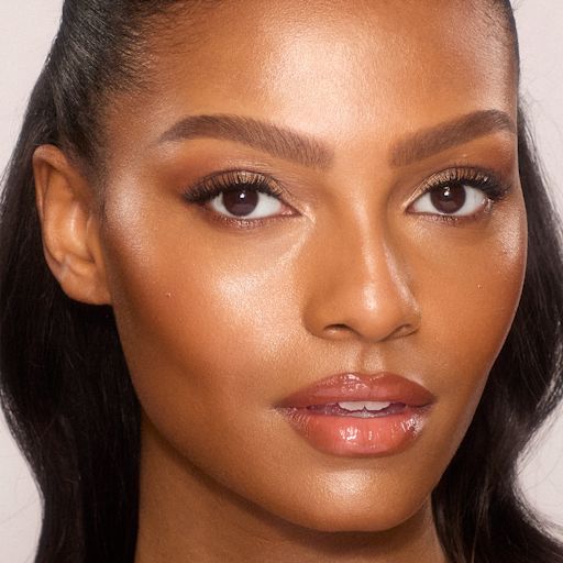 UNREAL SKIN SHEER GLOW TINT - 12 TAN UNREAL SKIN SHEER GLOW TINT - 12 TAN