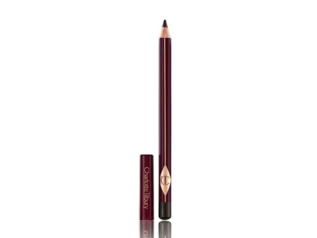 The Classic Eyeliner in Classic Brown open An open eyeliner pencil in a soft dark brown colour with its cap next to it.