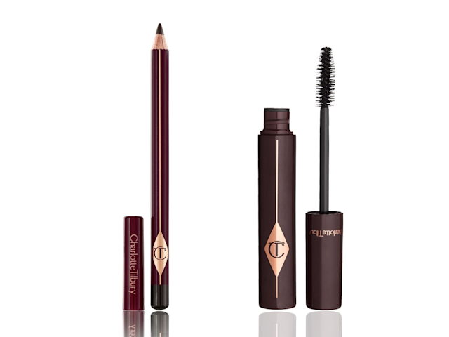 The Classic Audrey and Full Fat Lashes open An open eyeliner pencil with its lid next to it with an open mascara tube with its applicator next to it, both in dark crimson packaging.