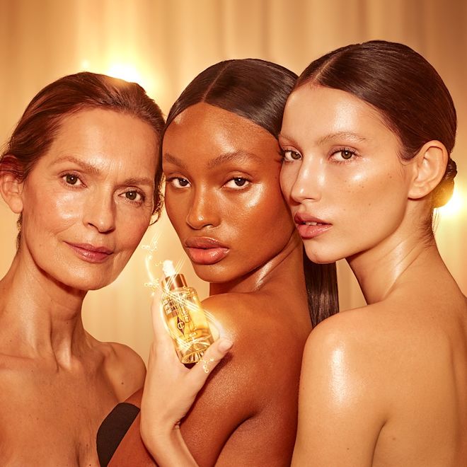 Collagen Face Oil group shot Three models holding Collagen Superfusion Facial Oil