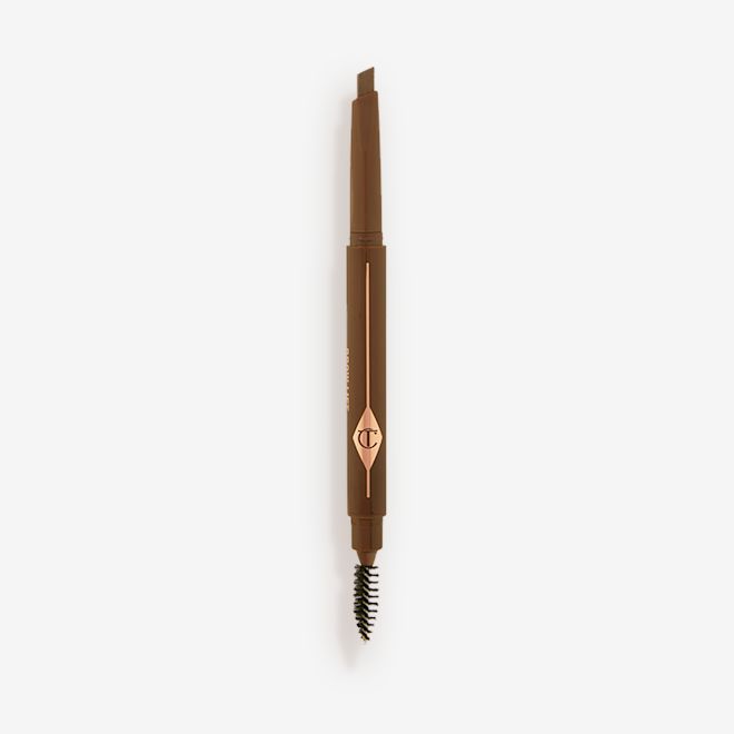 Brow Lift in Medium Brown open An open, double-ended eyebrow pencil and spoolie brush duo in a medium brown shade with medium-brown-coloured packaging