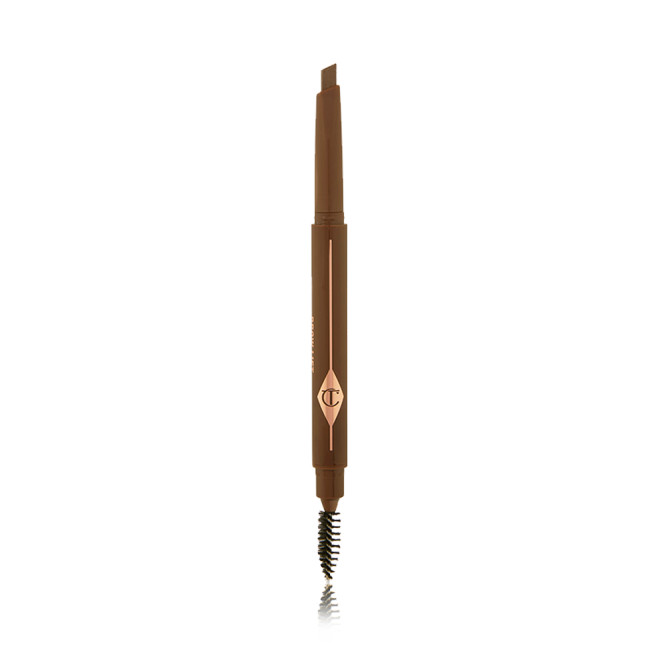 An open, double-ended eyebrow pencil and spoolie brush duo in a medium brown shade with medium-brown-coloured packaging 