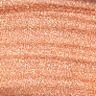 Beauty Light Wand in Pillow Talk Medium swatch Close-up swatch of a shimmery, pinky-peach liquid highlighter with very fine shimmer.