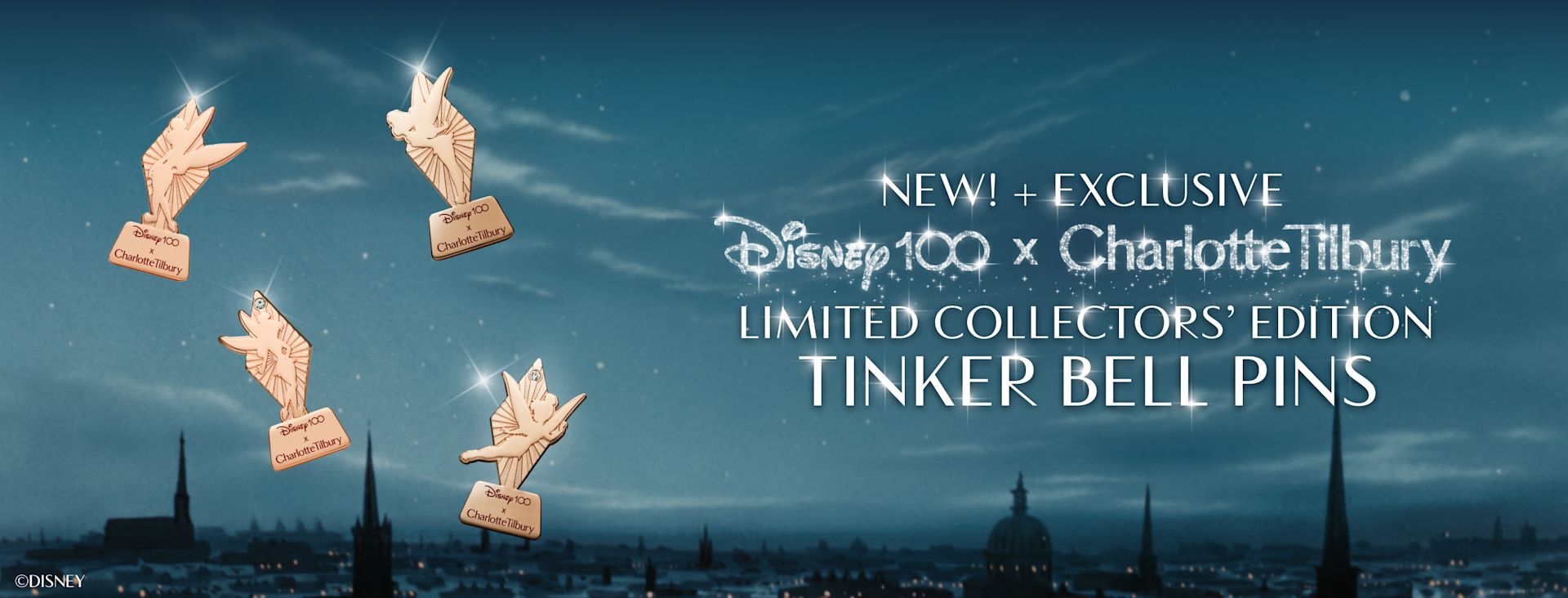 Disney100 x Charlotte Tilbury Tinker Bell pin Diamond-shaped rose-gold Disney pin in collaboration with Charlotte Tilbury with Tinker Bell silhouette and Disney100 x Charlotte Tilbury logo.