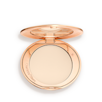 Airbrush Flawless Finish in Fair open An open, pressed powder compact in a cream colour.