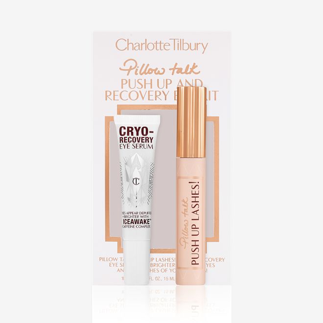 Pillow Talk Recovery Eye Kit with box Black mascara in a sheer pink-coloured tube with text on it that reads, 'Pillow Talk Push up lashes!' and a gold-coloured lid with an eye serum in a white-coloured tube in front of their packaging box.