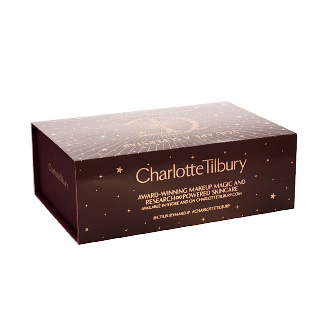 You are a Superstar Sleeve for Gifting Black-coloured makeup sleeve with golden stars and a starburst pattern on the front and the CT logo printed in gold colour in the middle along with the text, ''you are a superstar' written on top.