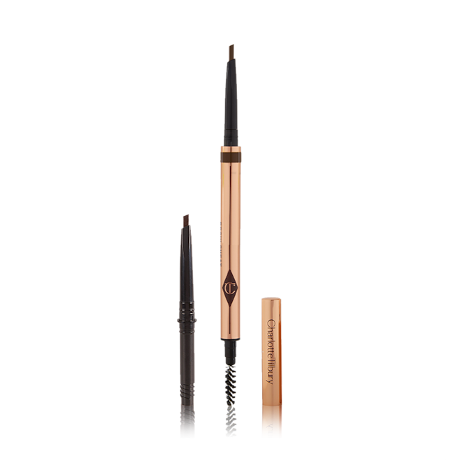 Brow Cheat in Dark Brown Full Size and Refill Kit open A double-ended eyebrow pencil and spoolie brush duo in a dark brown shade with gold-coloured packaging and the refill besides it.