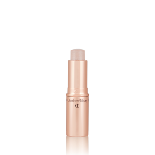 Quick & Easy Instant 5 Minute Kit in Chic Glow Highlighter open An open, highlighter stick in soft opal colour with a golden-coloured tube.