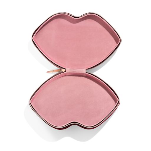 Shop the Hot Lips makeup bag and store your must-have makeup and skincare in the lip-shaped compartment. Shop the Hot Lips makeup bag and store your must-have makeup and skincare in the lip-shaped compartment.