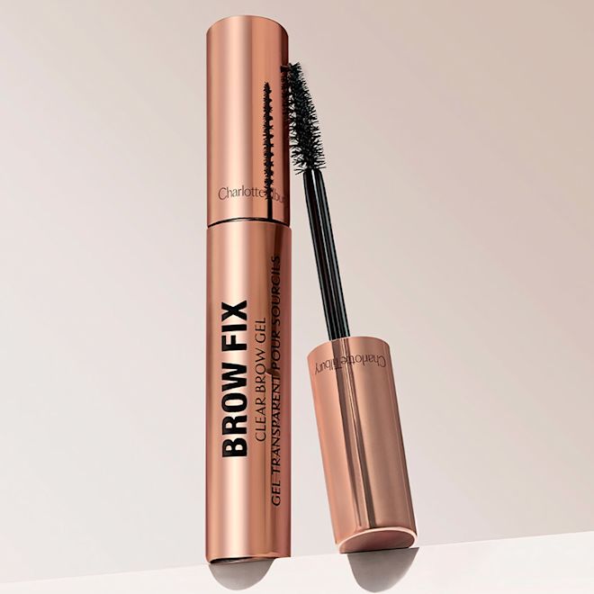 Brow Fix clear Sculpting Gel with and without lid Sculpting eyebrow gel with a spoolie applicator in rose-gold-coloured packaging.