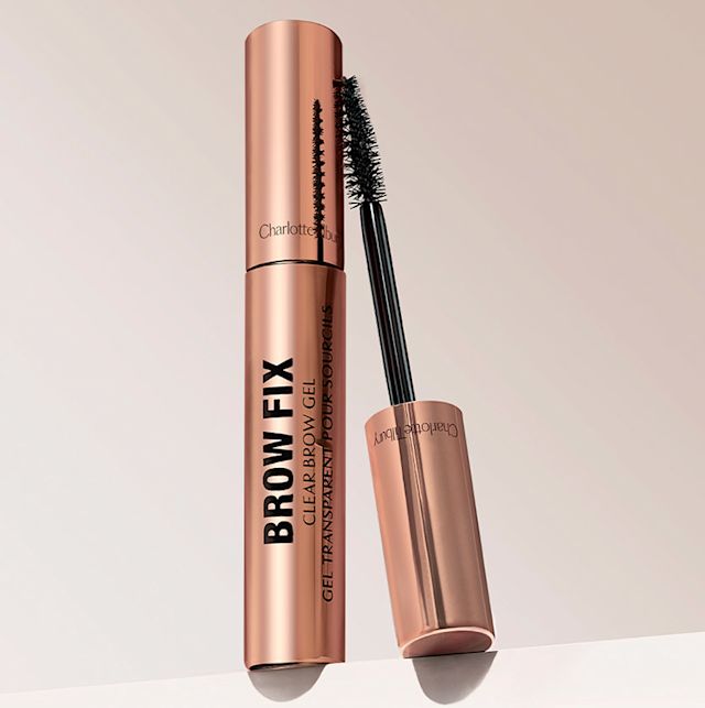 Brow Fix clear Sculpting Gel with and without lid Sculpting eyebrow gel with a spoolie applicator in rose-gold-coloured packaging.