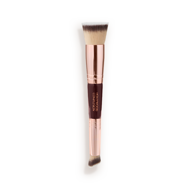 Synthetic Hollywood Complexion Contour Brush A double-ended contour brush with soft bristles and rose gold and dark crimson handle.