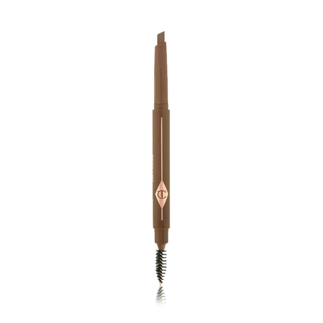 An open, double-ended eyebrow pencil and spoolie brush duo in a soft brown shade with soft-brown-coloured packaging 