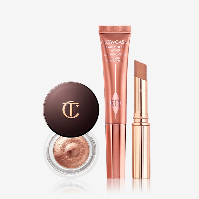 Glitter Galaxy Kit Glitter Galaxy Kit Containing Eyes to mesmerise cream eyeshadow, pillow talk diamonds lipstick and Beauty light wand bronzer.