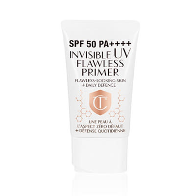 Invisible UV Flawless Poreless Primer packshot for blog A primer in a white-coloured tube with a white-coloured lid with text on it that reads, 'invisible UV Flawless poreless primer SPF 50 PA++++'.