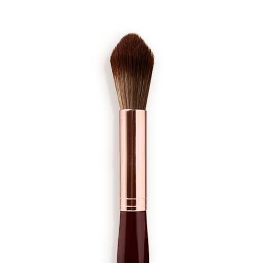 Synthetic Powder and Sculpt Brush close-up Close-up of a powder brush with brown-coloured bristles with a rose-gold and dark crimson handle.