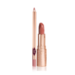 An open lip liner pencil in nude pink shade along with an open matte lipstick in a terracotta shade. 