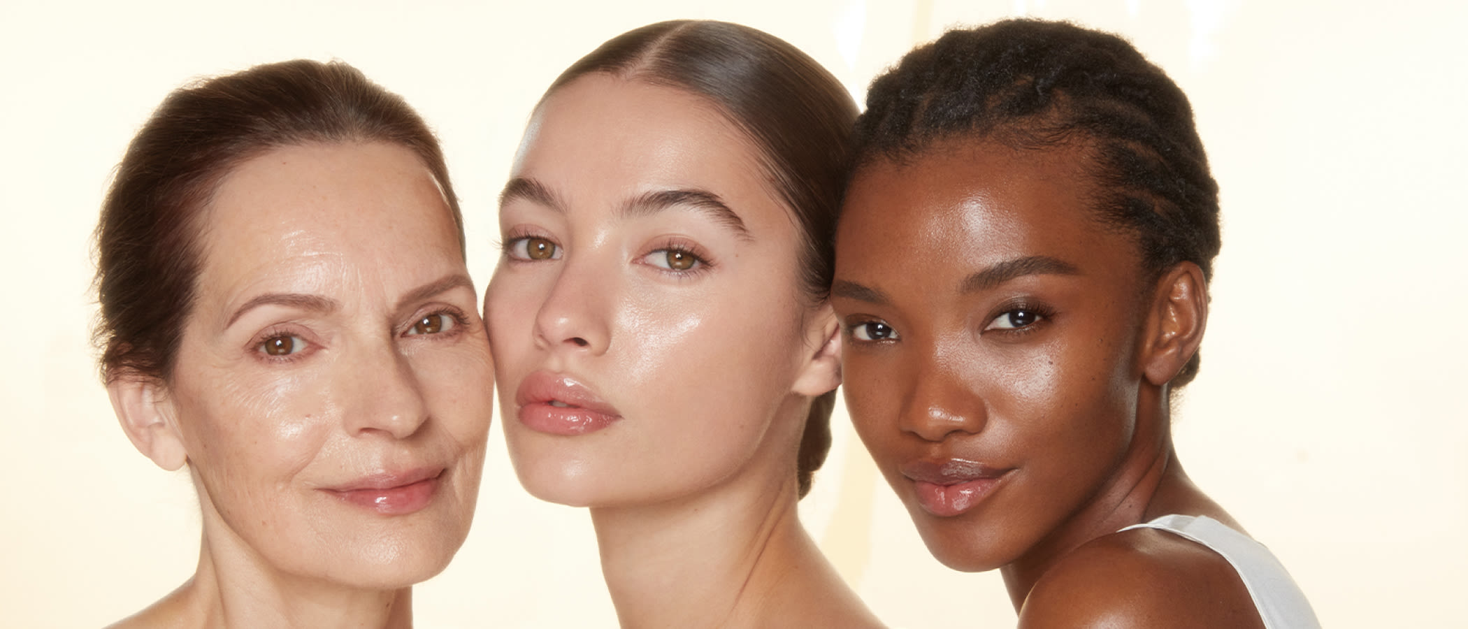 Skincare Guides and Advice blog Posts by Occasion a mature fair skin, young fair skin and deep skin model looking at camera with a glowy complexion