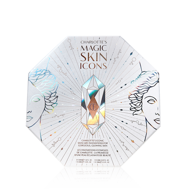 Charlotte's Magic Skincare Icons Box A white-coloured hexagon-shaped skincare gift box with illustrations of silver-coloured goddesses on it along with the CT logo printed on top.