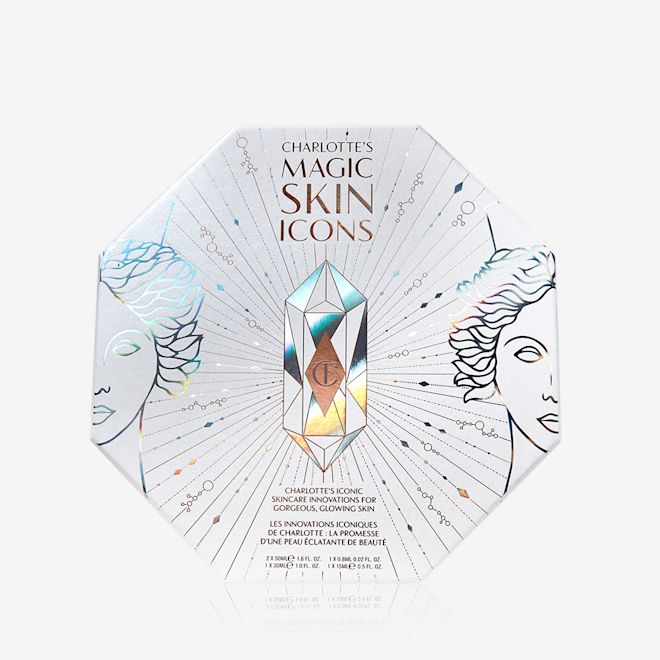 Charlotte's Magic Skincare Icons Box A white-coloured hexagon-shaped skincare gift box with illustrations of silver-coloured goddesses on it along with the CT logo printed on top.