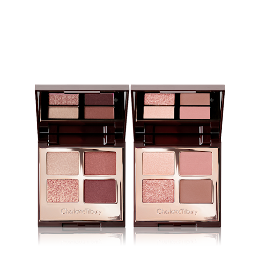 Luxury Palettes open Two mirrored-lid quad eyeshadow palettes with matte and shimmery eyeshadows, one with rose gold and brown shades and the other with pink and brown shades, and both having a bright beige enhancing shade.